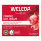Weleda Firming Day Cream packaging with pomegranate illustration on a red background.