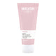 Weleda Gentle Milk Cleanser pink and white tube on a white background.