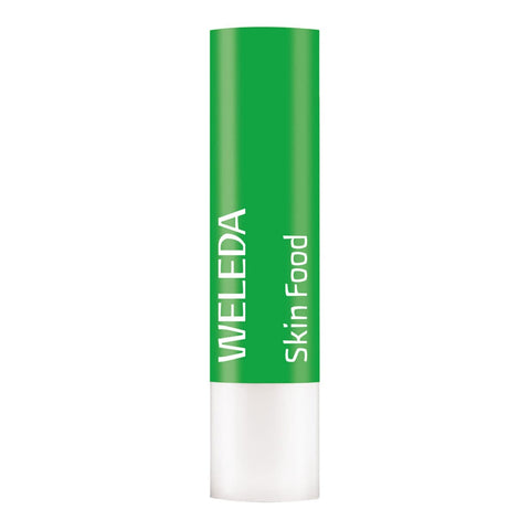 Weleda Skin Food Lip Stick 4.8g on a white background.