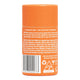 An orange cylindrical bottle of stick of deodorant from Woohoo shown from the back, featuring a white text label with a barcode, ingredients list, and recycling symbols on a white background.